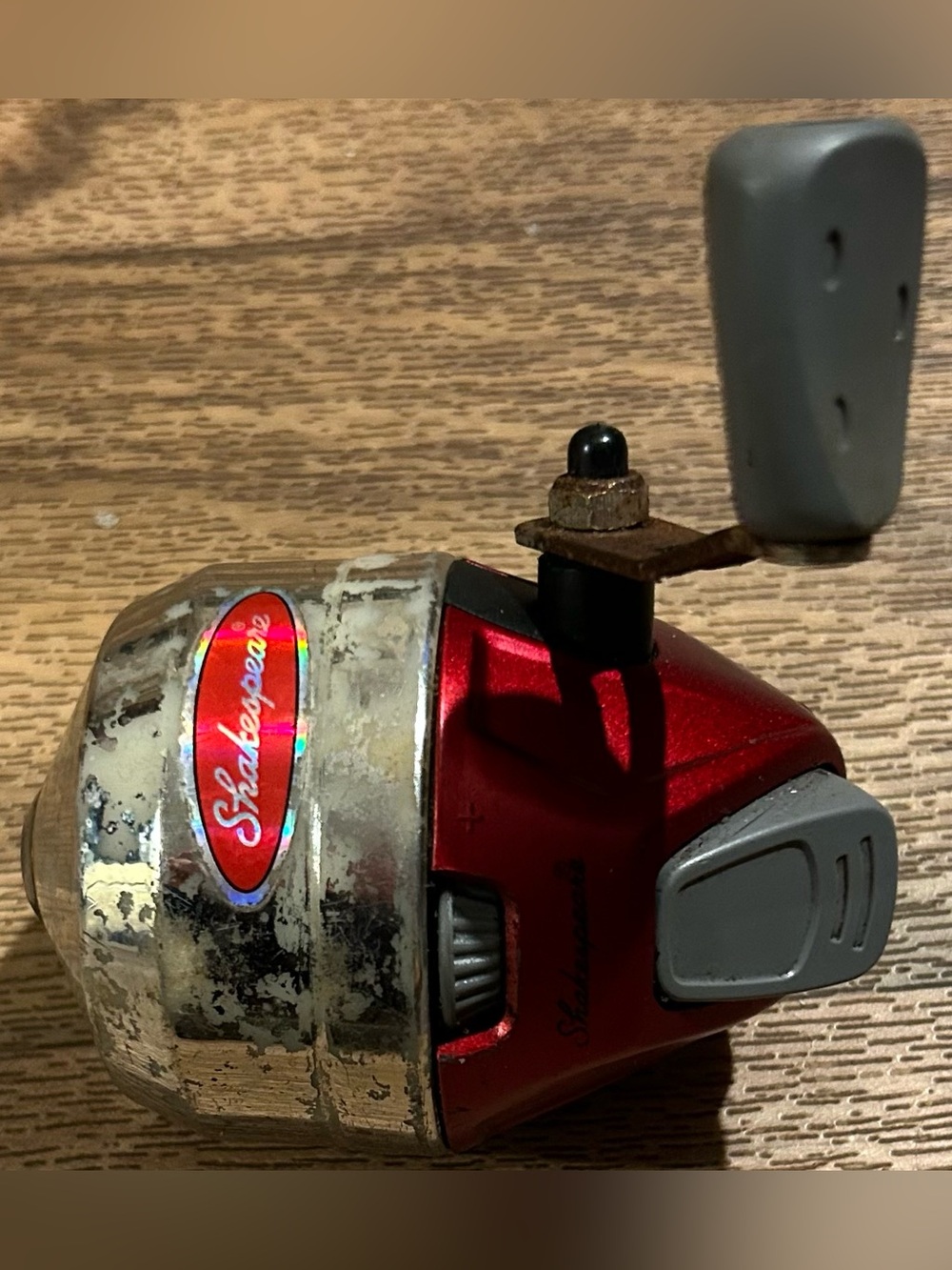 Shakespeare Red & Silver Fishing Reel